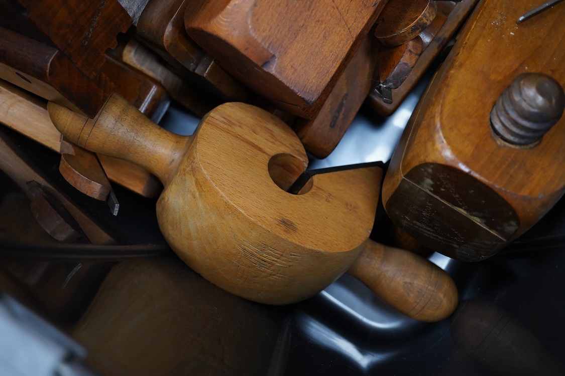 Fifty early 20th century woodworking moulding planes, etc. by John Moseley & Son, London, A.Mathieson & Son, Glasgow, Buck, Tottenham Court Road, Preston, Christopher Johnson & Co., Malloch & Son, Perth, most with the bo